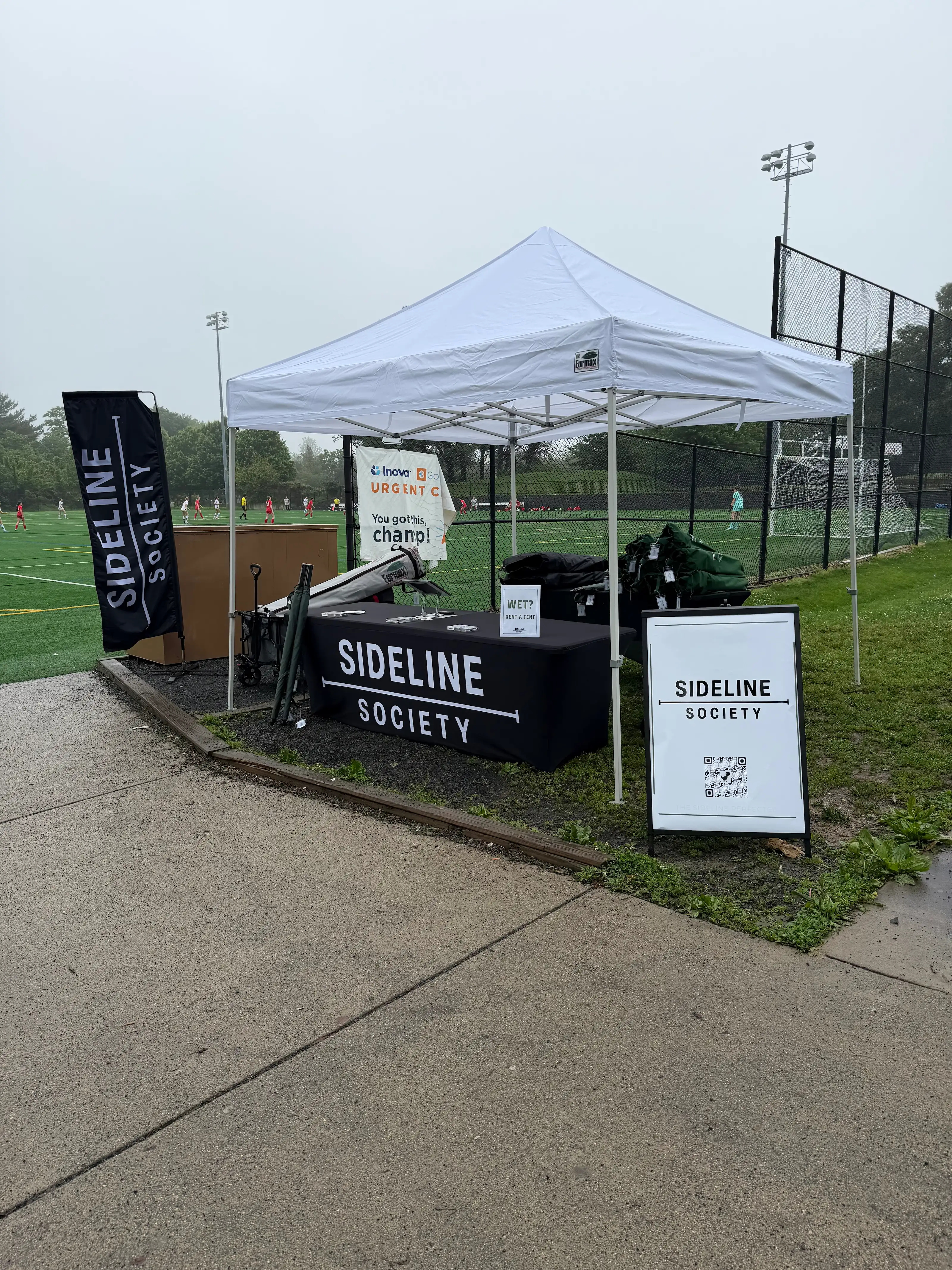 Sideline Society canopy tent and folding chairs at Loudoun Soccer Park during Cannon Cup 2026
