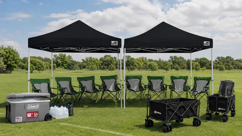 The Team HQ — 2 canopy tents, 8 chairs, 2 wagons, cooler, water, and trash bags set up on a tournament field